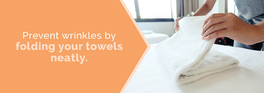 Fold your towels to prevent wrinkles